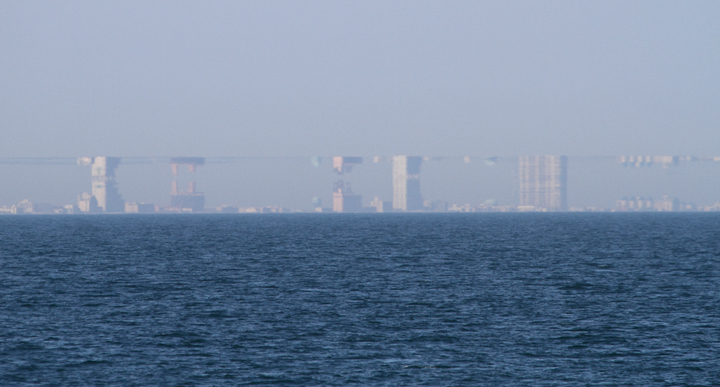 A mirage of Ocean City turned upside down from a Poor Man's Pelagic on the Judith M - Ocean City, Maryland (3/20/2010). Photo by Bill Hubick.